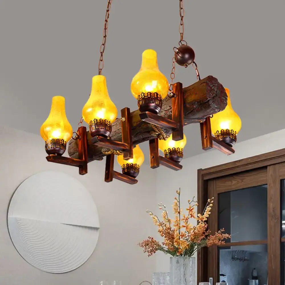 Rustic wooden log dining room chandelier with yellow crackle glass