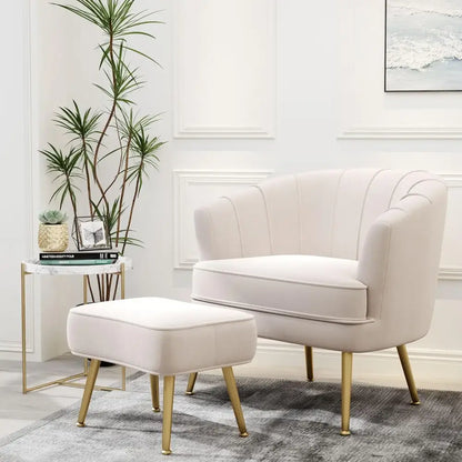 comfortable beige bucket armchair and ottoman living room