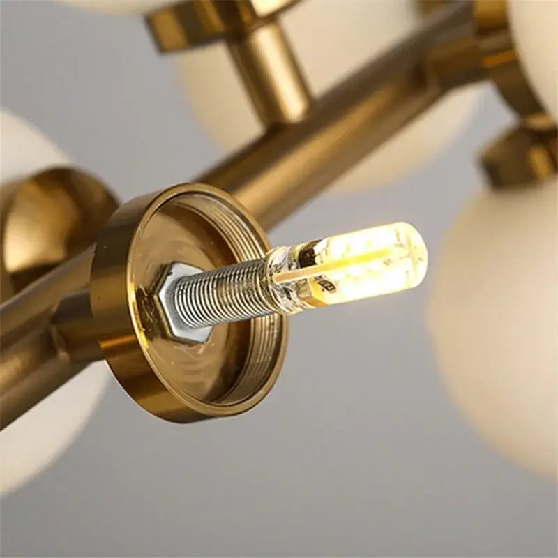 Modern black & gold chandelier with white glass ball for living room