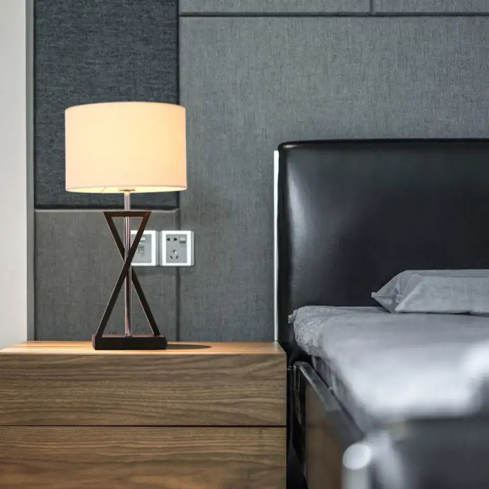Modern hourglass table lamp with white fabric shade – bedroom lighting