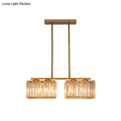 Modern gold linear chandelier with clear cuboid crystal dining room