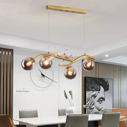 Modern branch gold & black dining room pendant smoke grey cognac glass