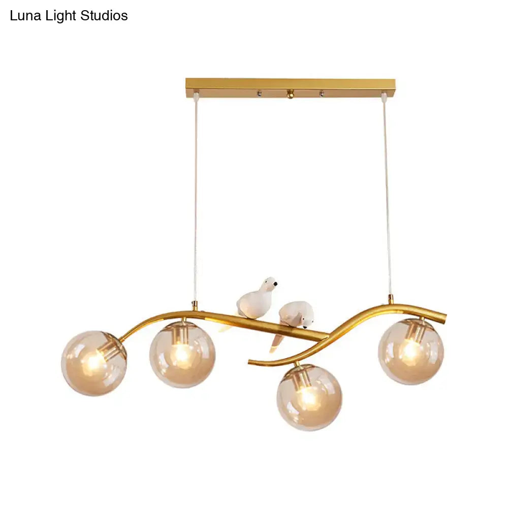 Modern branch gold & black dining room pendant smoke grey cognac glass