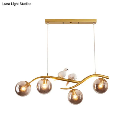 Modern branch gold & black dining room pendant smoke grey cognac glass