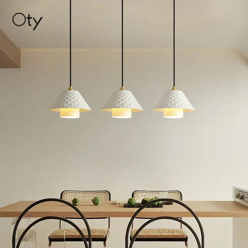 Textured white and gold ceramic pendant lights for kitchen dining room