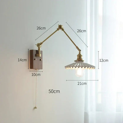 copper swing arm wall lamp with glass shade for bedroom