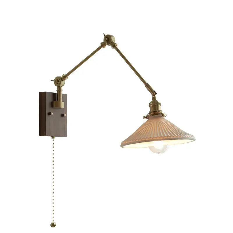 copper swing arm wall lamp with glass shade for bedroom