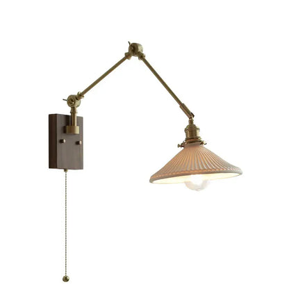 copper swing arm wall lamp with glass shade for bedroom