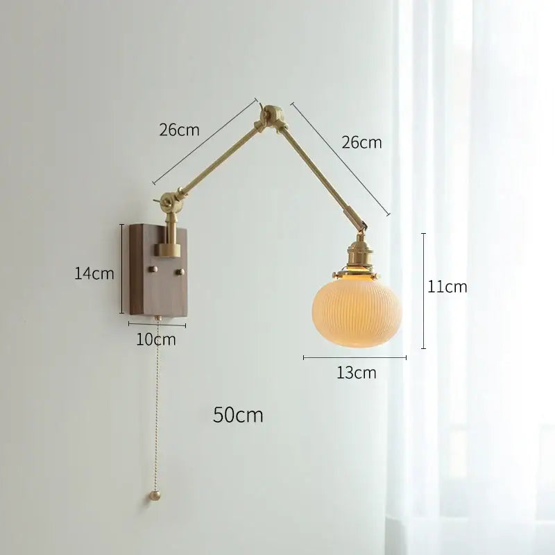 copper swing arm wall lamp with glass shade for bedroom