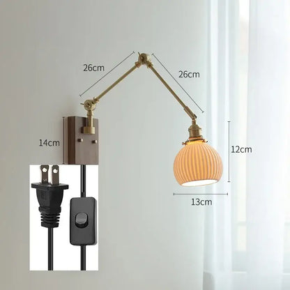 copper swing arm wall lamp with glass shade for bedroom