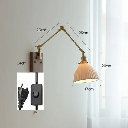 copper swing arm wall lamp with glass shade for bedroom