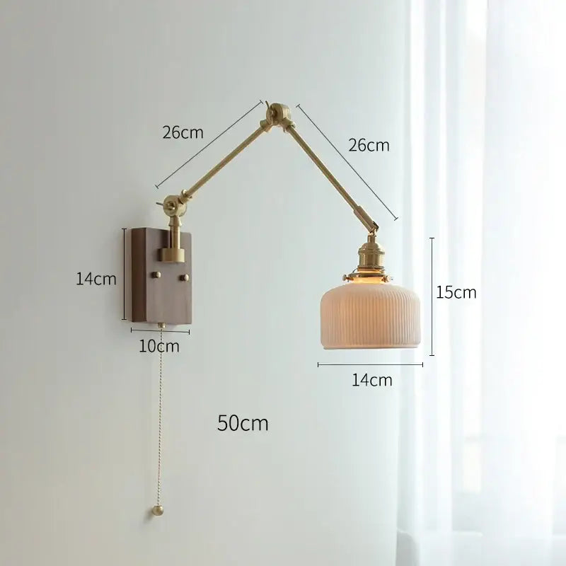 copper swing arm wall lamp with glass shade for bedroom