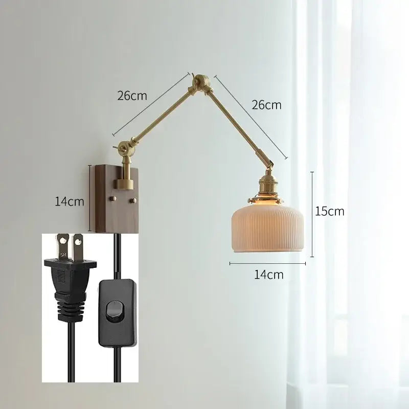 copper swing arm wall lamp with glass shade for bedroom