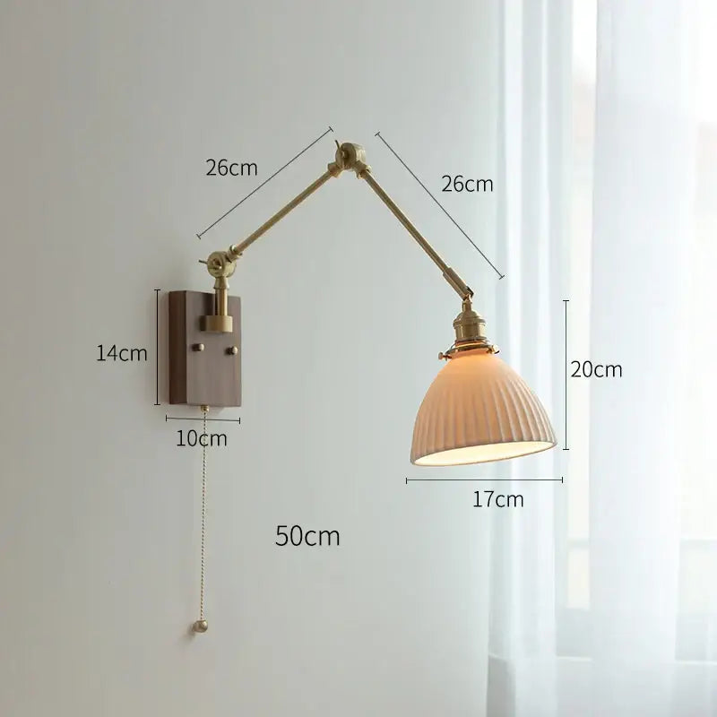 copper swing arm wall lamp with glass shade for bedroom