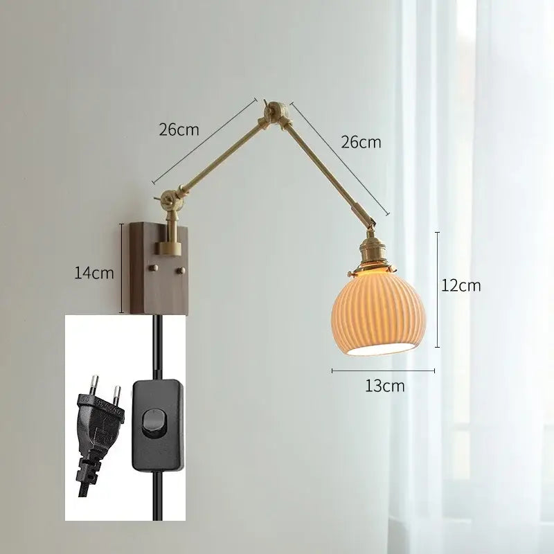 copper swing arm wall lamp with glass shade for bedroom