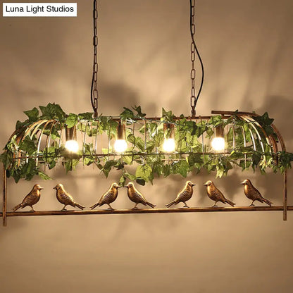 Rustic bronze birdcage island light with faux ivy dining room pendant