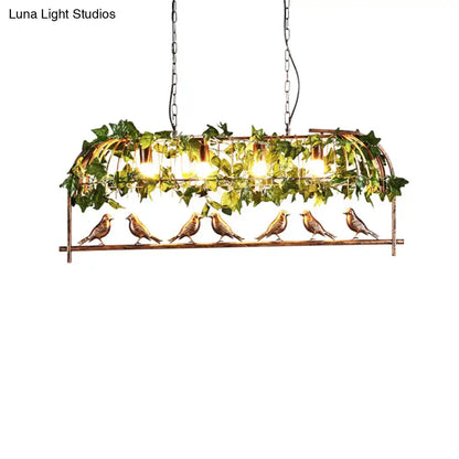 Rustic bronze birdcage island light with faux ivy dining room pendant