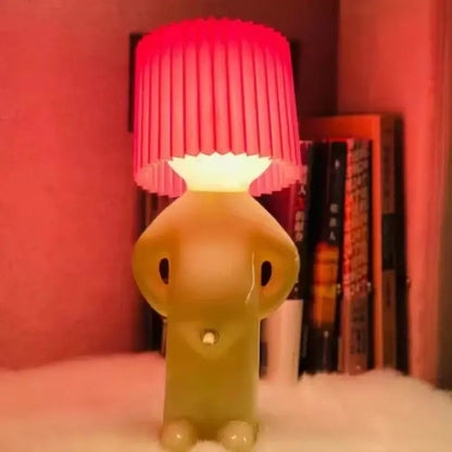 Whimsical beige and yellow naughty boy table lamp for bedroom bedside