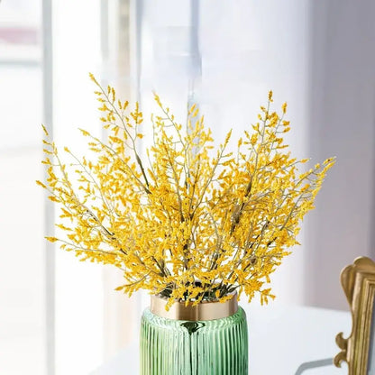 Mint green ceramic vase with yellow lemon grass branch living room