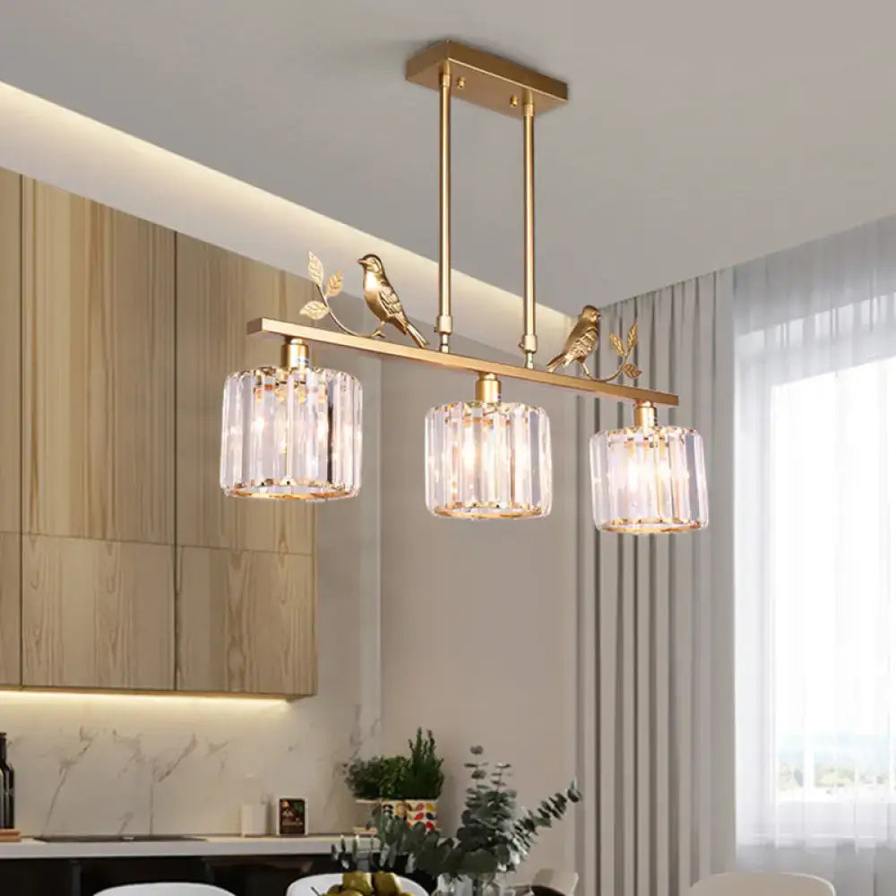 Black crystal prism island light fixture with leaf decor dining room