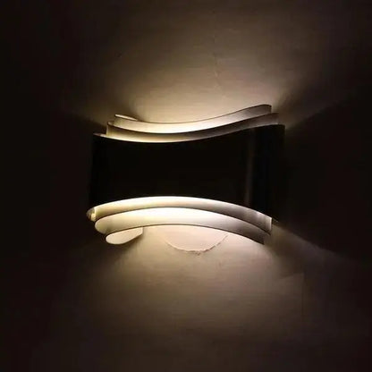 Curved modern wall sconce brushed stainless steel living room light
