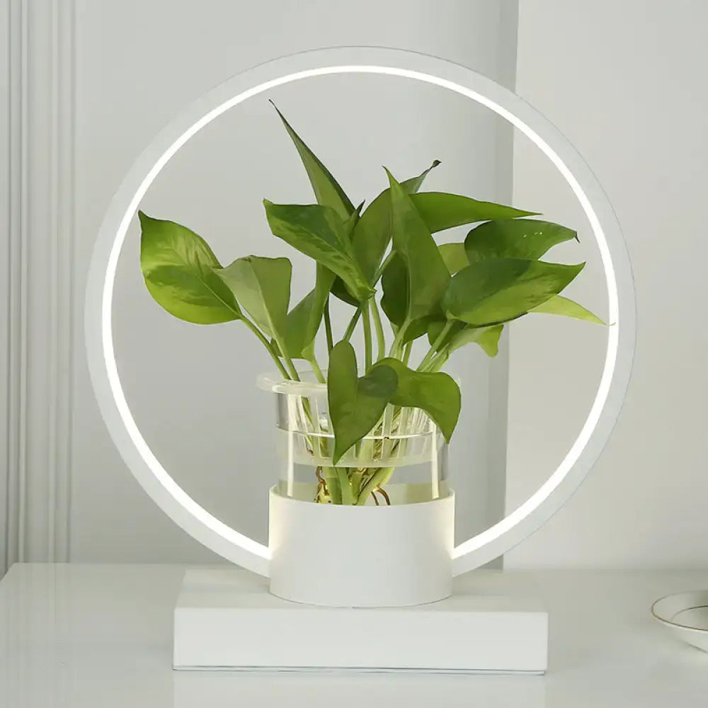 Modern white circular led ring lamp with glass plant cup bedroom