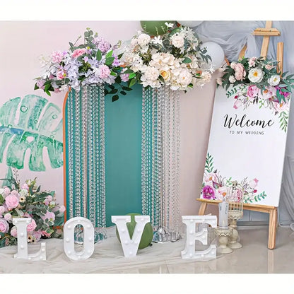 Elegant gold metal vases with crystals and roses wedding decor