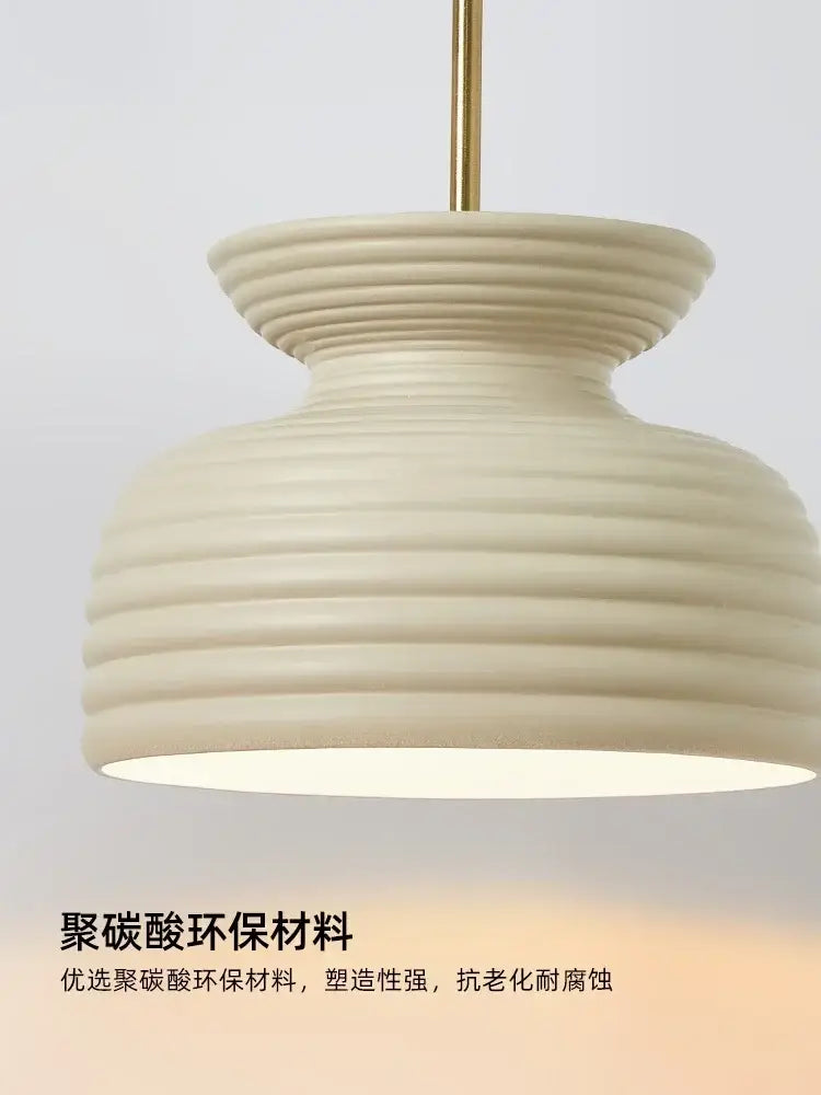 french minimalist off-white ribbed chandelier dining room