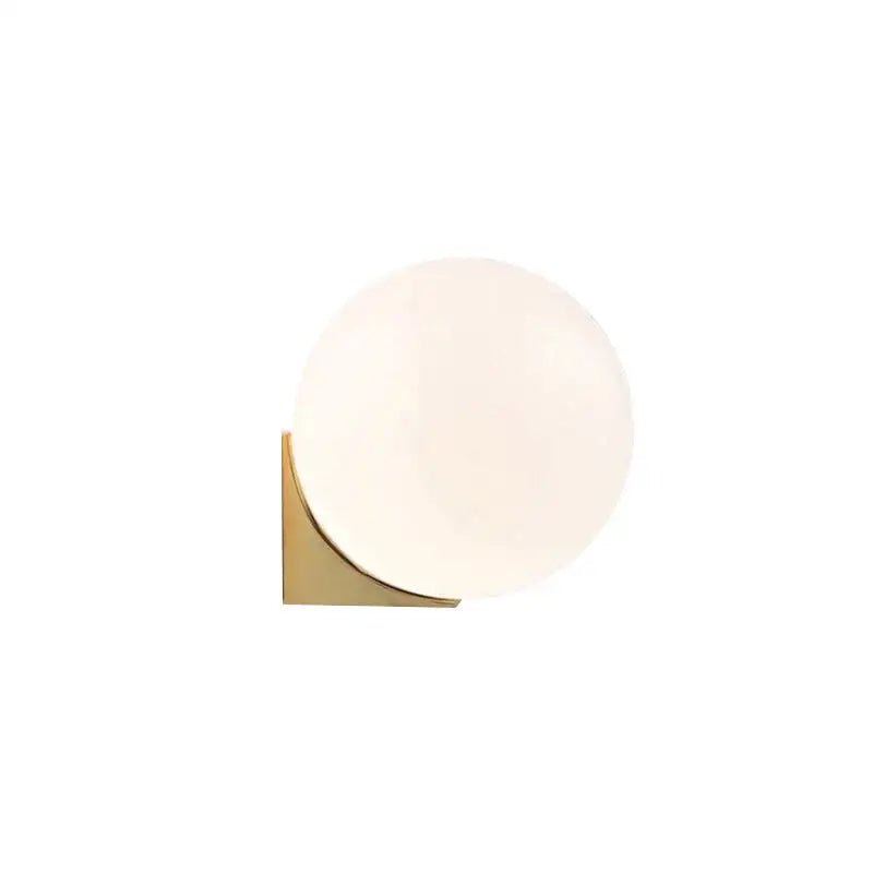 Minimalist brass and glass ball art wall lamp for bedroom