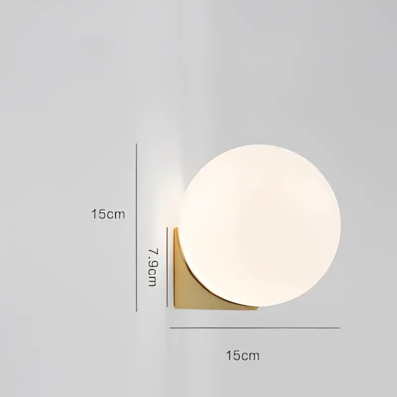 Minimalist brass and glass ball art wall lamp for bedroom