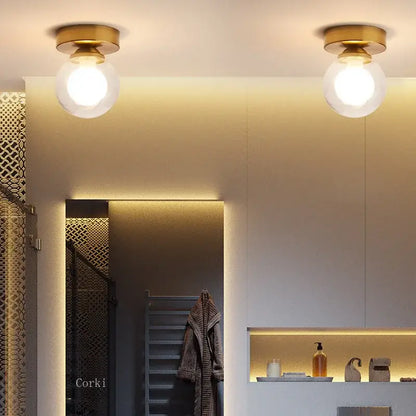 Modern brass & black glass ball ceiling light for living room