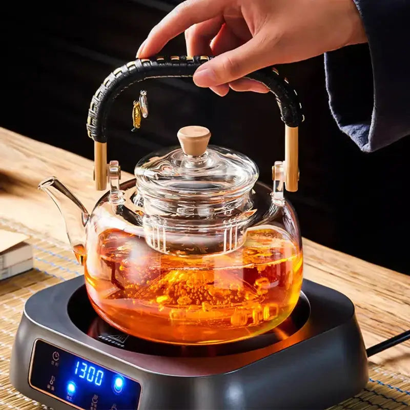 Modern glass tea pot with weave handle – kitchen steaming kettle