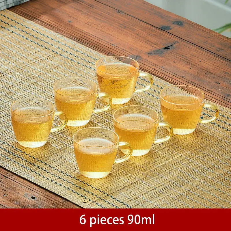 Modern glass teapot with gold knob and cups dining room tea set