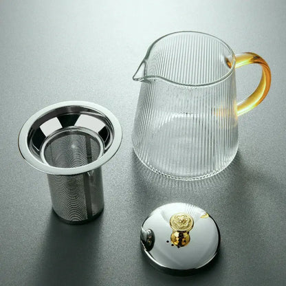 Modern glass teapot with gold knob and cups dining room tea set