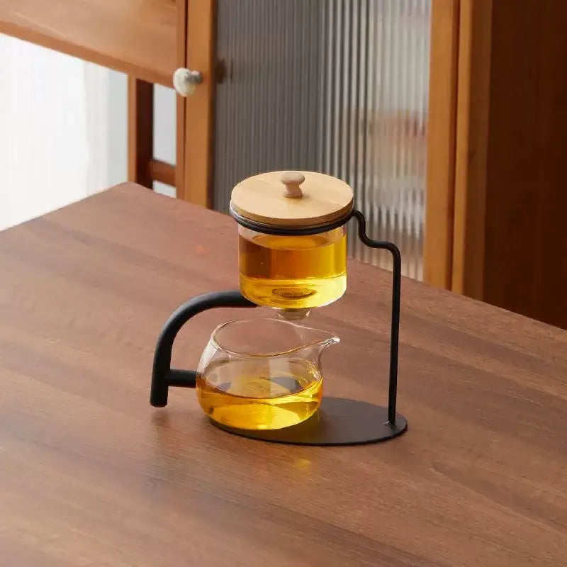 Modern glass teapot set with wooden lid and gold frame dining room