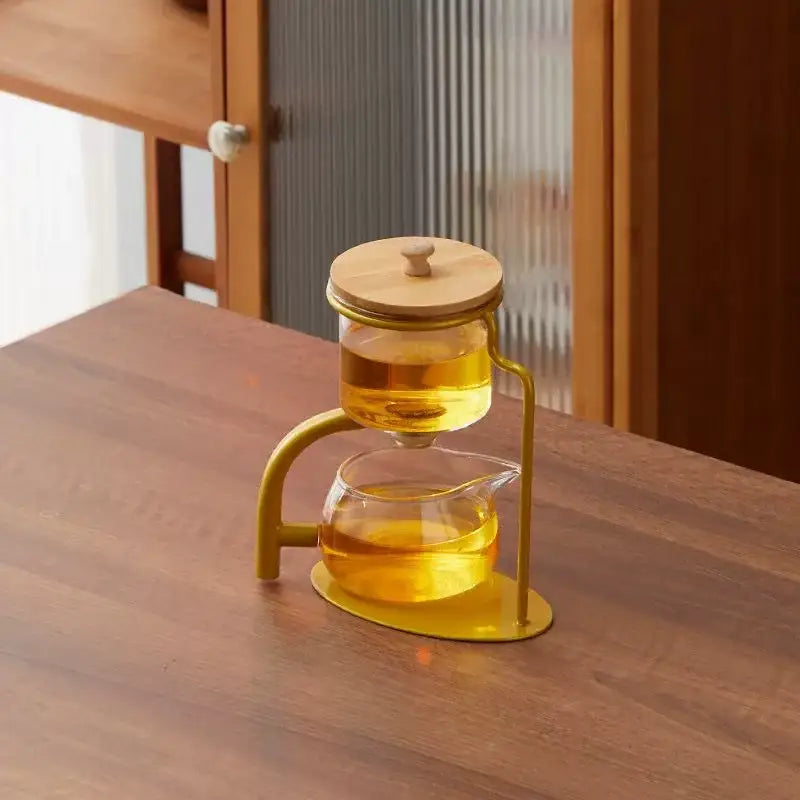 Modern glass teapot set with wooden lid and gold frame dining room