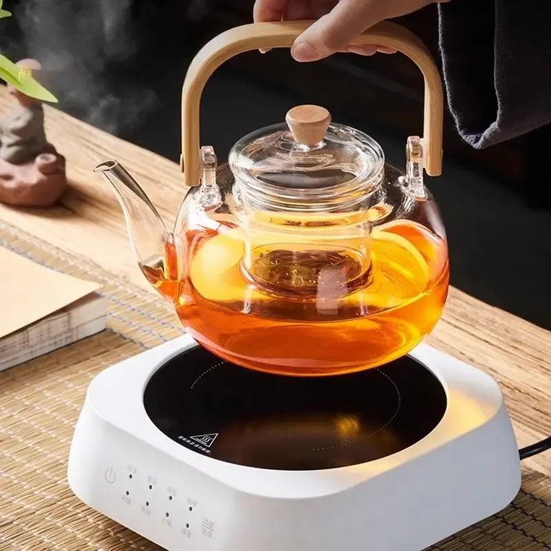 Modern glass teapot with wood handle for kitchen and dining room
