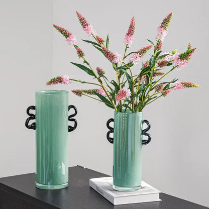 Modern mint green glass vase with black handles living room decor