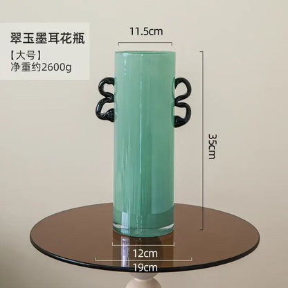 Modern mint green glass vase with black handles living room decor