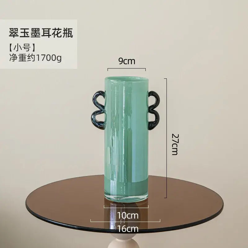 Modern mint green glass vase with black handles living room decor