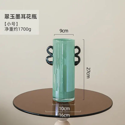 Modern mint green glass vase with black handles living room decor
