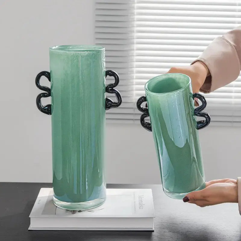 Modern mint green glass vase with black handles living room decor