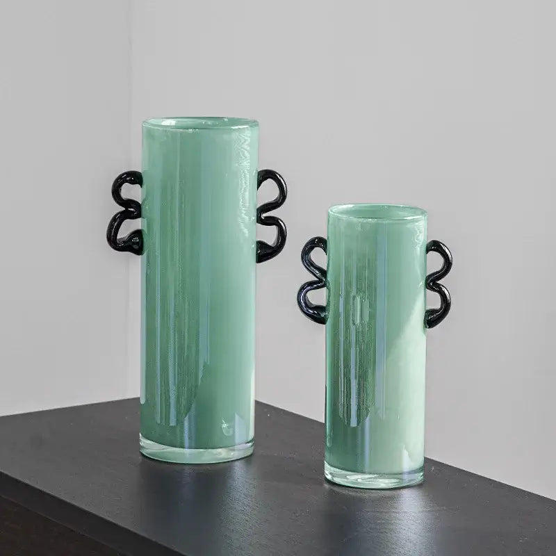 Modern mint green glass vase with black handles living room decor