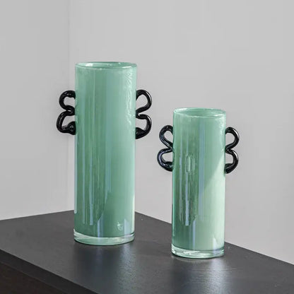 Modern mint green glass vase with black handles living room decor