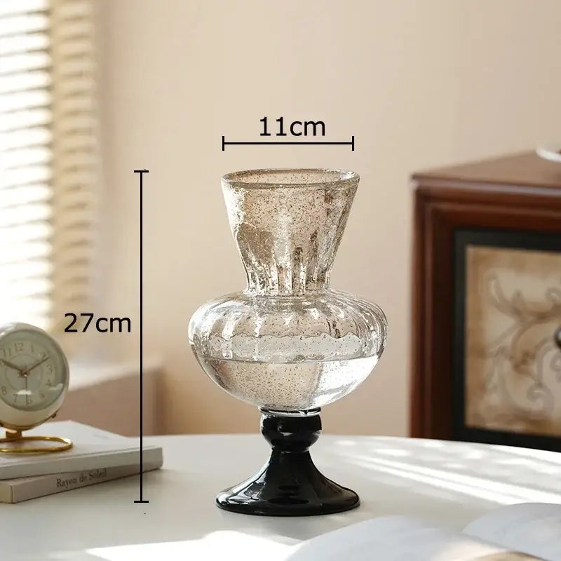 Textured clear glass vase with black base living room decor
