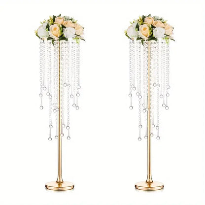 Elegant gold metal vases with crystals and roses for dining room