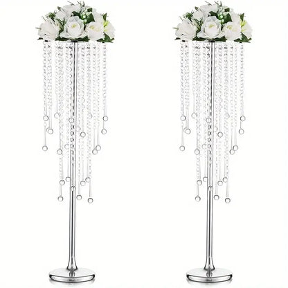 Elegant gold metal vases with crystals and roses for dining room