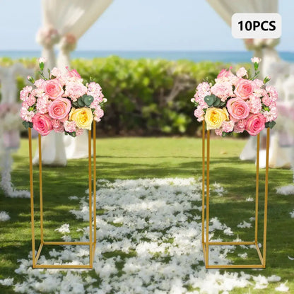 Gold metal wedding flower stand set with pink roses for dining room