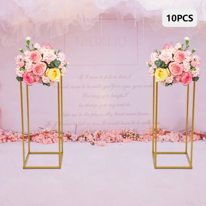 Gold metal wedding flower stand set with pink roses for dining room