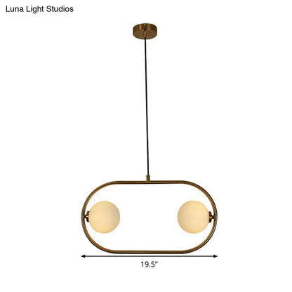 Modern gold globe hanging chandelier with frosted glass – bedroom